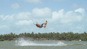 a Guy Doing a Kitesurfing Tricksin the Air